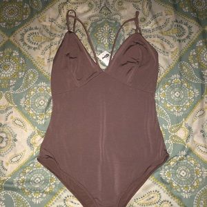 Tan/brown body suit